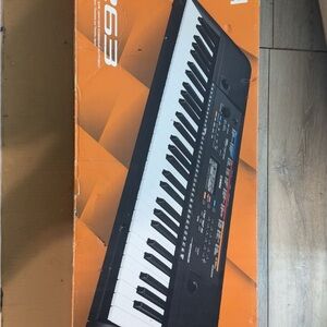 Yamaha Black and White Digital Piano